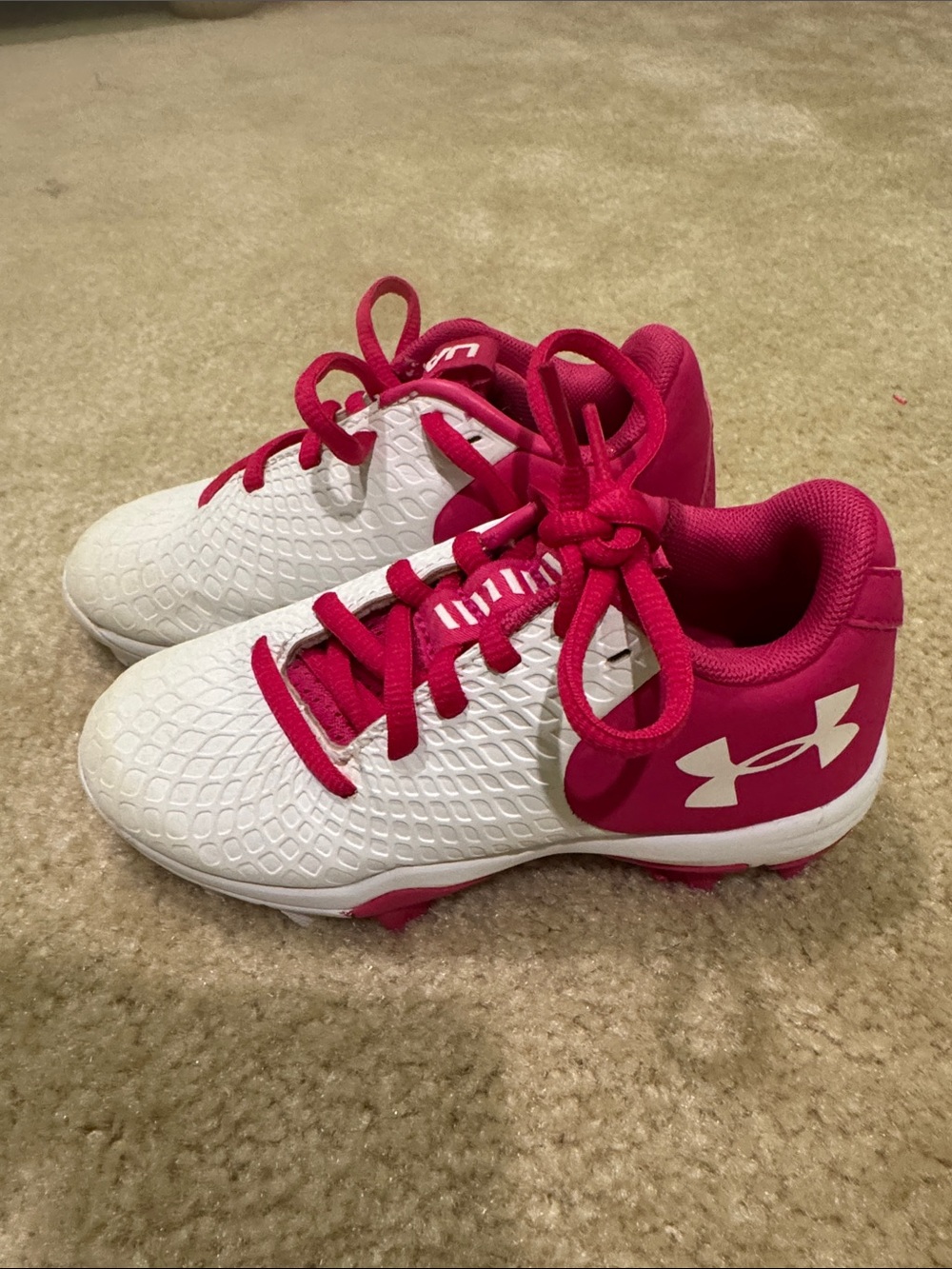 Under Armour White and Pink Kids' Cleats